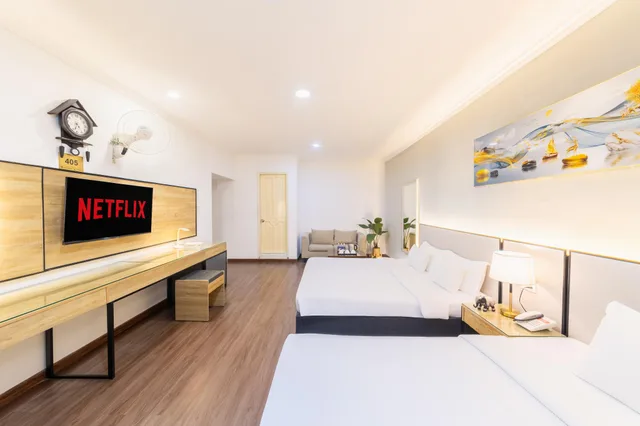 غرفة ديلوكس عائلية بسرير مزدوج وسرير فردي، A25 Hotel - 35 Mac Thi Buoi 2/2
