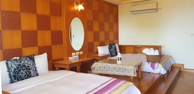 غرفة قياسية رباعية بسريرين مزدوجين بإطلالة على البحر، Ming-Jun Holiday Inn 6/10