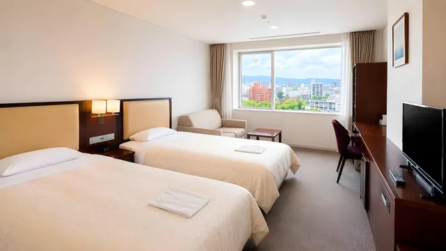 غرفة قياسية بسريرين منفصلين بإطلالة على النهر، Mielparque Kumamoto Hotel 1/2
