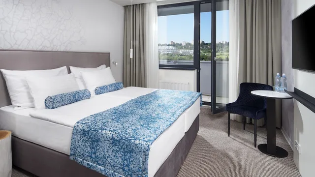 غرفة ديلوكس بسرير مزدوج أو سريرين منفصلين، Orea Resort Santon 1/2