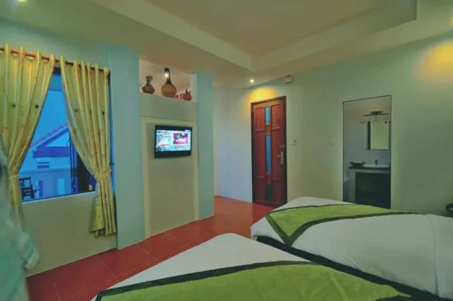 غرفة ديلوكس بسرير كينج بشرفة، Starfruit Homestay Hoi An 10/10