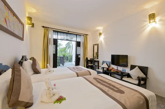 غرفة عائلية بسريرين منفصلين وسرير كينج بإطلالة على المدينة، Hoi An Coco River Resort Spa 3/10