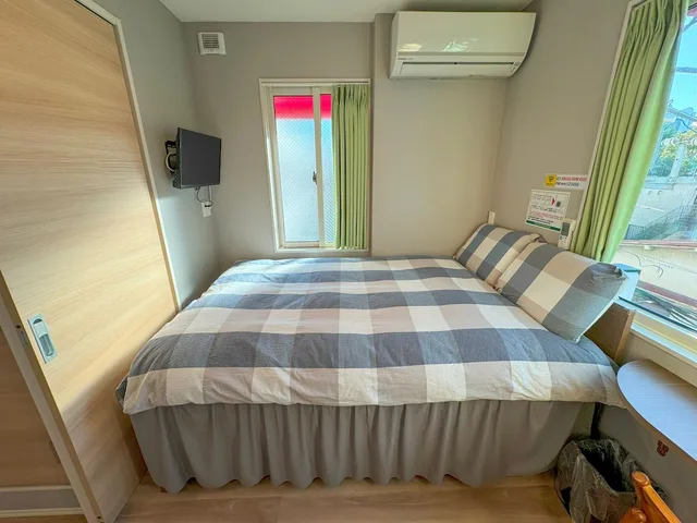 غرفة عائلية بسريرين منفصلين في المبنى الرئيسي، Shinjuku Warm House 6/10
