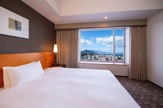 غرفة بسرير نصف مزدوج، Hotel Nikko Oita Oasis Tower 1/7