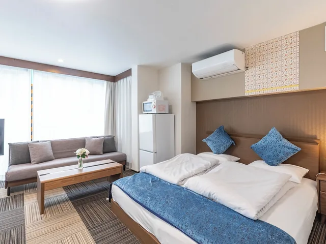 غرفة عائلية بسريرين منفصلين وسرير كينج وسرير فردي مع أريكة، Sakuragawa Riverside Hotel 4/10