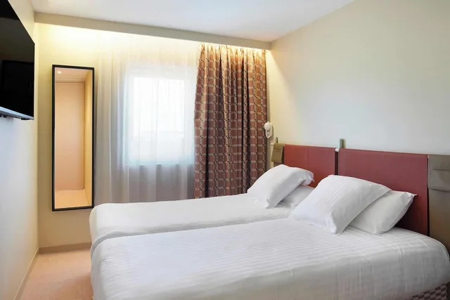غرفة قياسية بسريرين منفصلين، Hotel des Victoires - Restaurant 1/8