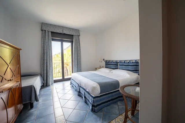 غرفة ديلوكس ثلاثية بسرير كينج، Alberi del Paradiso Hotel 5/10