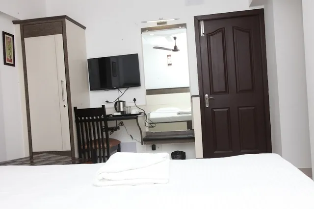 غرفة عائلية بسريرين مزدوجين، Hotel Karpagam International 1/5