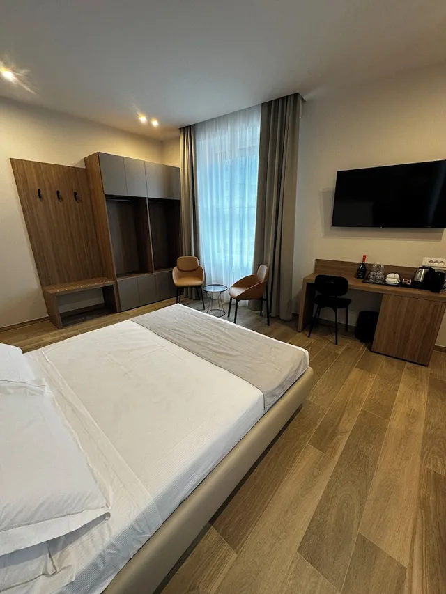 غرفة كومفورت بسرير كوين بإطلالة على المدينة، Aparthotel Durini 1/8