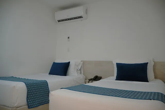 غرفة قياسية بسريرين منفصلين، Hotel Laureles Plaza 3/6