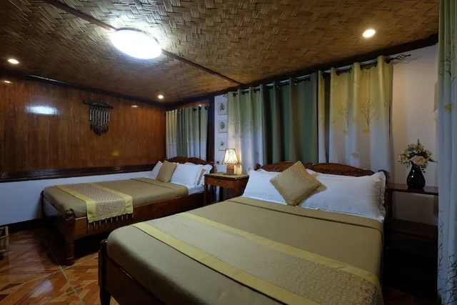 Deluxe, 1 Single and 3 Queen Beds، Villa Khadine Grandvista Resort 1/3