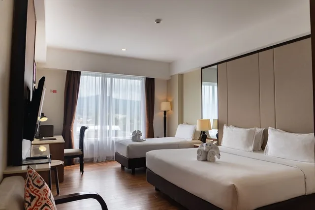 غرفة عائلية بسرير كوين وسرير فردي، Grand Sunshine Resort and Convention 1/6