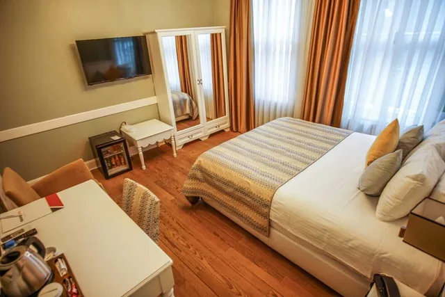 غرفة ديلوكس بسرير كوين وسريرين منفصلين، Rodosto Hotel 4/9