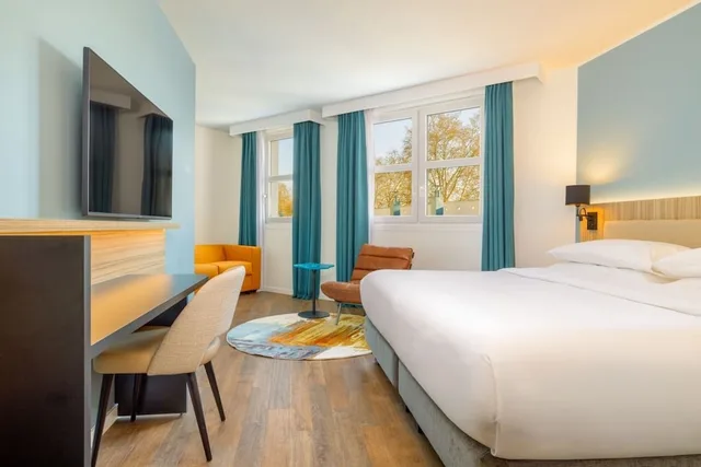 جناح جونيور بسرير كينج مع أريكة، Four Points by Sheraton Reims Cathedrale 1/4