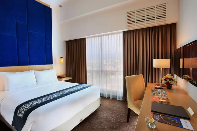 غرفة غراند ديلوكس بسرير كوين، Swiss-Belinn Malang 1/4