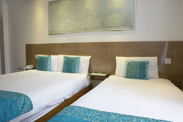 غرفة ثلاثية بسرير مزدوج وسرير فردي، Westpoint Hotel 2/4