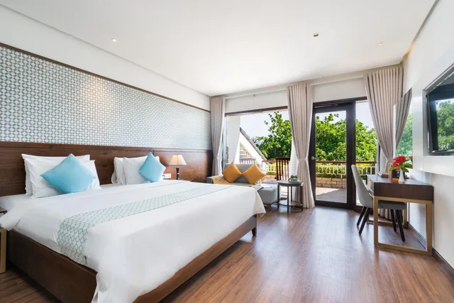 غرفة ديلوكس بسرير كينج بإطلالة على البحر، Hoang Ngoc Beach Resort 1/1