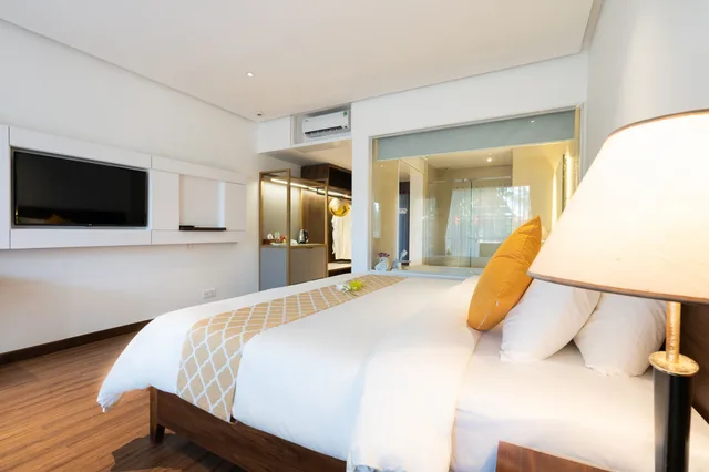 غرفة ديلوكس بسرير كينج بإطلالة على الحديقة، Hoang Ngoc Beach Resort 7/9