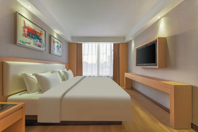 غرفة بزنس بسرير كوين، Meihao Mingyue Hotel International Finance City Keyun Road Metro Branch 1/10