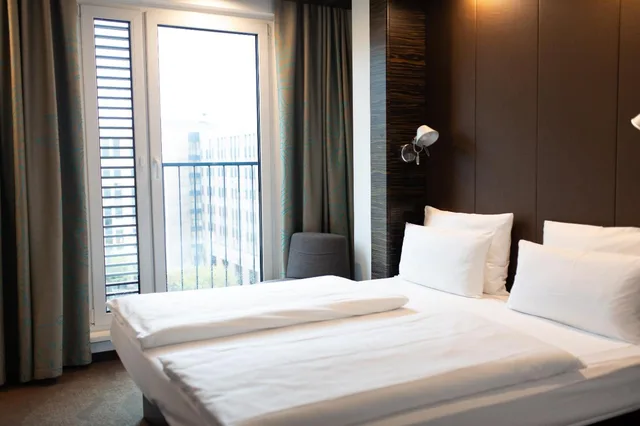 غرفة بسرير كينج، Hotel Motel One Dusseldorf-Hauptbahnhof 1/7