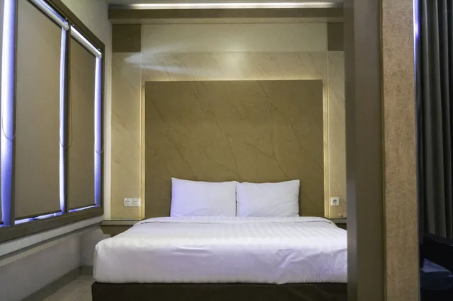 غرفة تنفيذية بسرير كوين، D Calia Tarakan Hotel 1/2