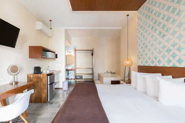 غرفة فاخرة بإطلالة على الحديقة، Quinta Margarita Suites 1/3