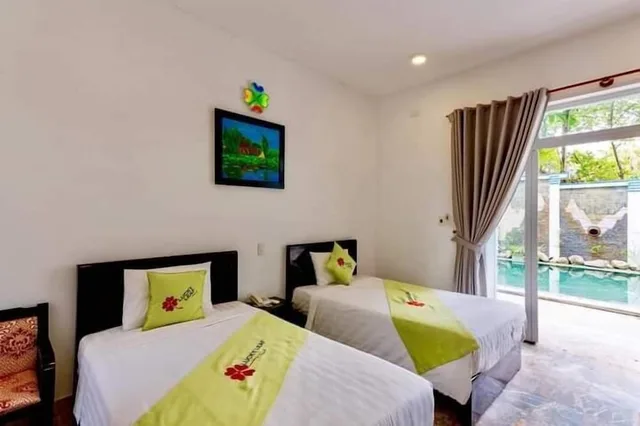 غرفة ديلوكس بسرير كوين وسرير فردي، Lucky Leaf Villa 2/5
