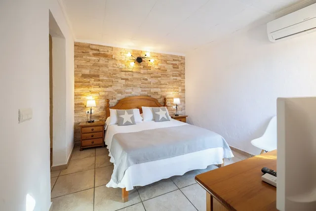 غرفة قياسية ثلاثية بسرير مزدوج وسرير فردي بإطلالة على الحديقة بشرفة، Lago Dorado Hotel 5/9