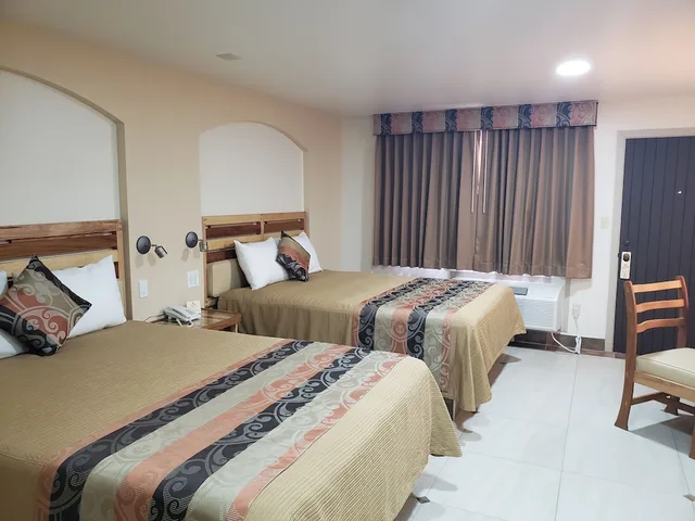 غرفة ديلوكس رباعية بسريرين كوين، La Villa de Zaragoza 1/9