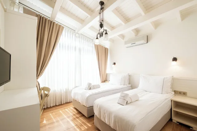 جناح رئاسي بسرير فردي بشرفة مع أريكة بجاكوزي، Viento Alacati Hotel 1/9