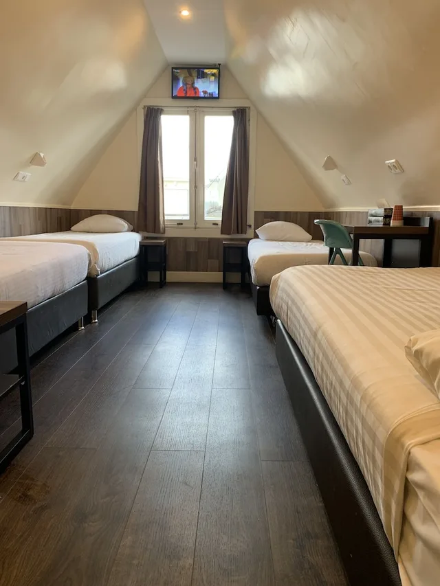 غرفة أساسية رباعية بأربعة أسرّة بحمام خاص، Orange Tulip Hotel 3/5