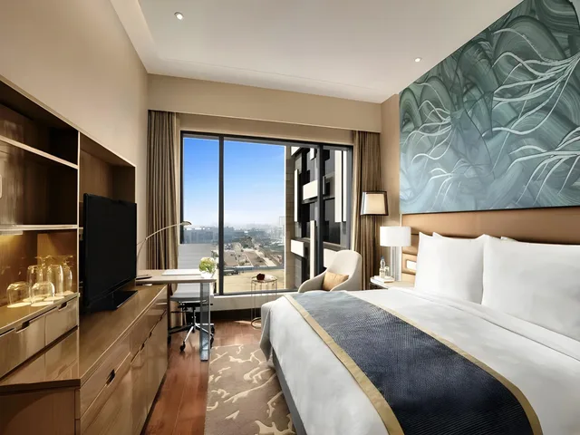 Premier, 2 Double Beds, The Leela Ambience Convention Hotel Delhi 1/1