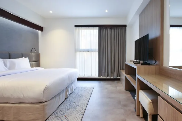 غرفة ديلوكس بسرير كينج بغرفة نوم واحدة، Sitara Hotel Apartment L.L.C 1/3
