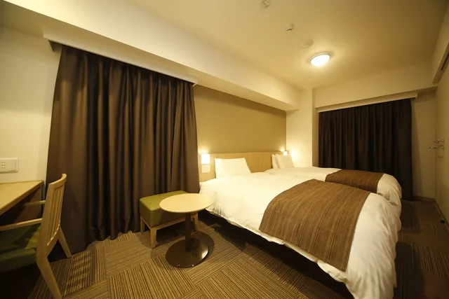 غرفة بسريرين منفصلين، DORMY INN HONHACHINOHE 3/4