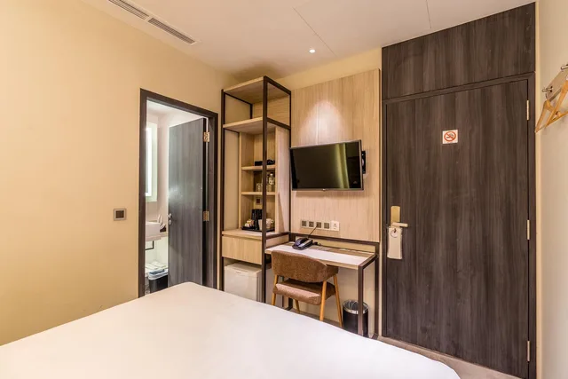 غرفة ثلاثية بسرير كينج مع أريكة، Santa Grand Hotel Boat Quay 1/2