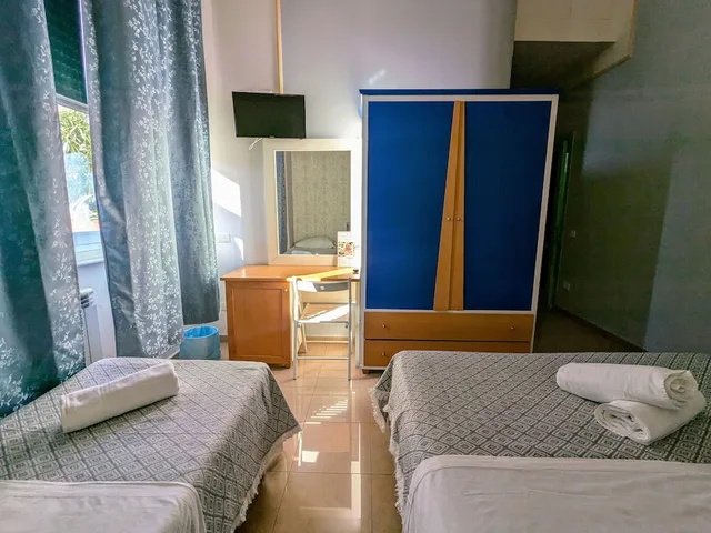 غرفة ثلاثية بسرير مزدوج وسرير فردي، Hotel Soggiorno Athena 6/10