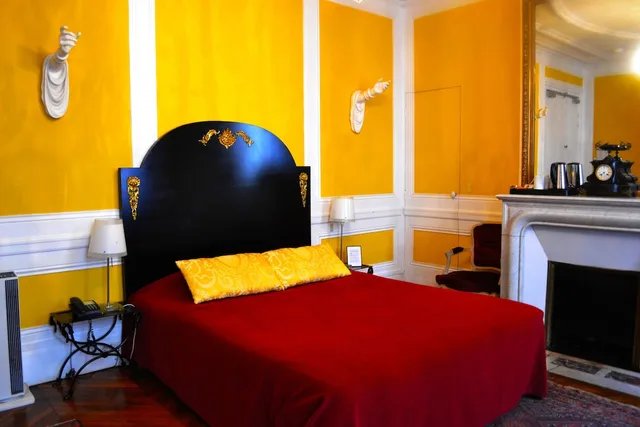 غرفة ديلوكس رباعية بسرير كينج وسرير فردي مع أريكة، Hotel Windsor Home Paris 4/8