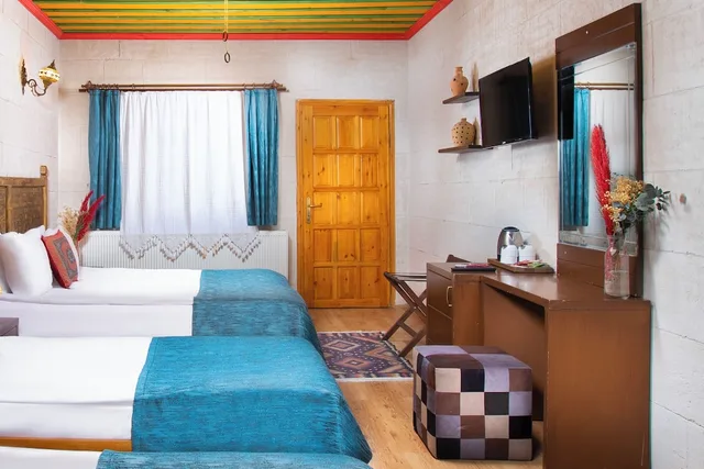 غرفة عائلية بسرير كينج وسريرين منفصلين، Garden Inn Cappadocia 3/7