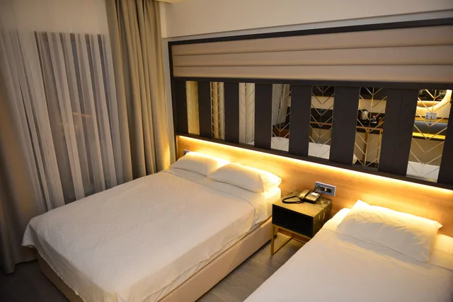 غرفة قياسية بسريرين منفصلين، Oasis Hotel 2/5
