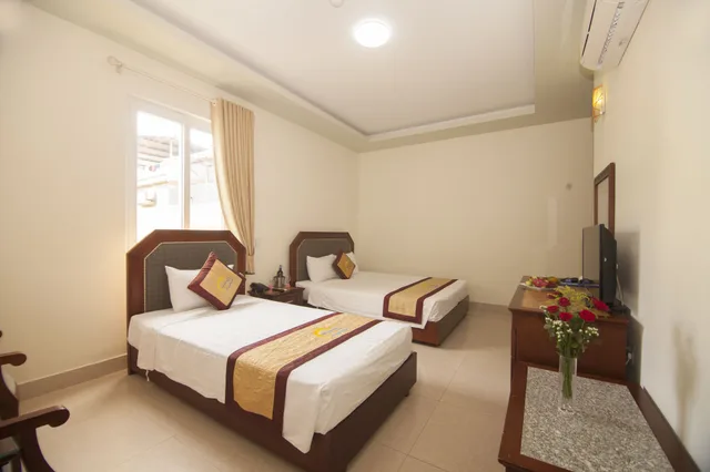 غرفة قياسية ثلاثية بسرير مزدوج وسرير فردي، Hai Long Hotel 3/5