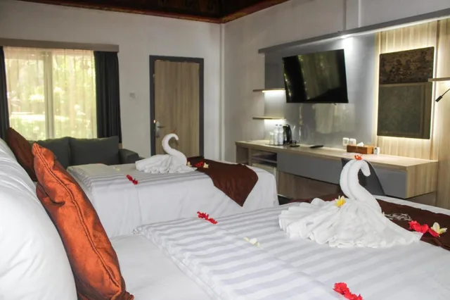 غرفة بسرير مزدوج أو سريرين منفصلين بإطلالة على المسبح، Melasti Beach Bungalows And Spa 3/10