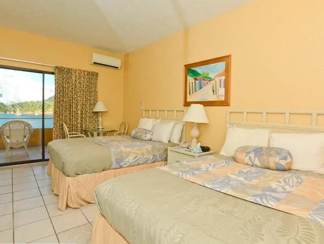 غرفة بسريرين مزدوجين بإطلالة على البحر، Lindbergh Bay Hotel And Villas 3/5