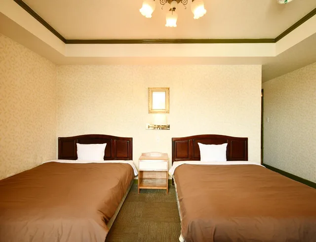 غرفة بسريرين مزدوجين، Sunrise Hotel 1/1