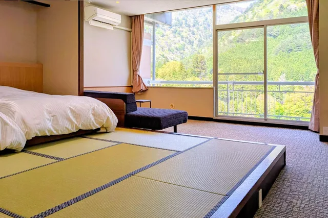 غرفة يابانية قياسية بسريرين منفصلين بحمام مشترك، New Shiobara Hotel 1/1
