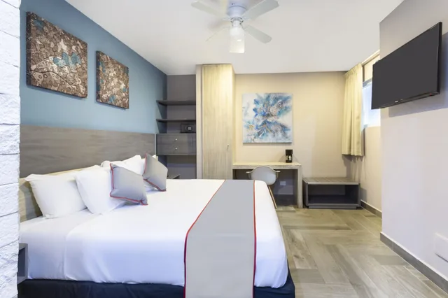 غرفة ديلوكس رباعية بسرير كينج، Illusion Xpress Downtown Playa 5/10
