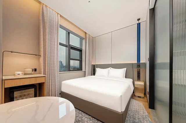 غرفة قياسية بسرير كينج، YiWu Zhonglian Kaixin Hotel 4/7