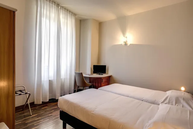 غرفة بسرير مزدوج أو سريرين منفصلين، Albergo Firenze 9/10