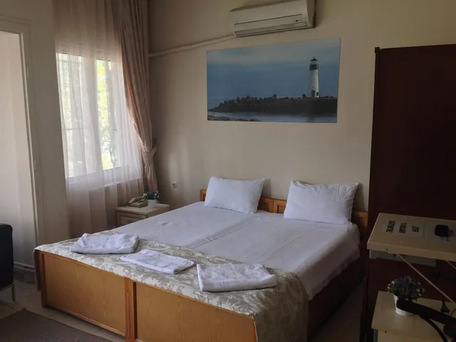 غرفة قياسية ثلاثية بسرير مزدوج وسرير فردي، Caylan Hotel 1/5