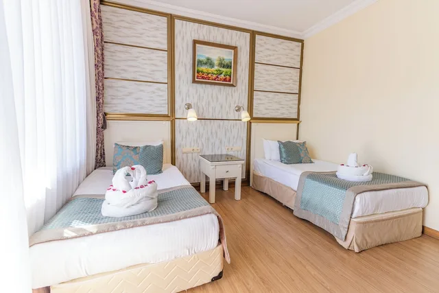 غرفة عائلية بسرير مزدوج وسريرين منفصلين، Thermalium Wellness Park Spa 1/3