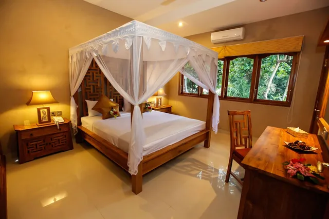 جناح بسرير مزدوج وسريرين منفصلين بغرفتي نوم، Puri Dajuma Beach Eco Resort & Spa 2/4